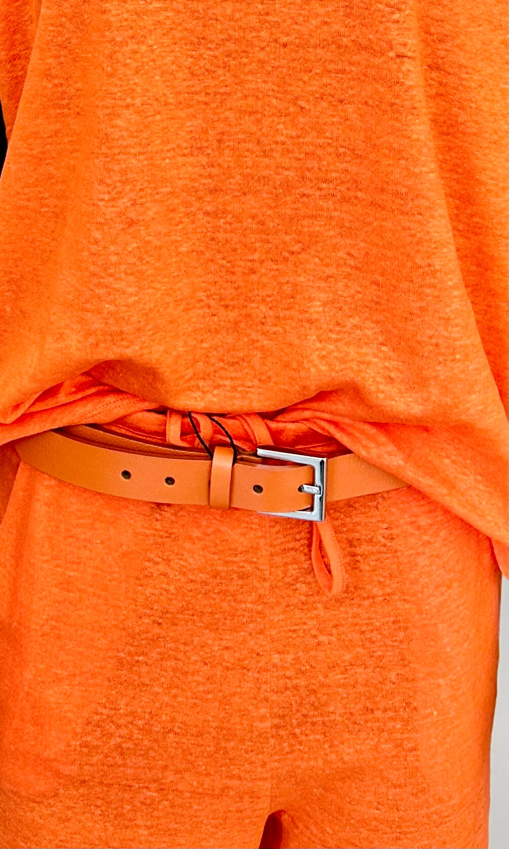 Skinnbelte i Oransje