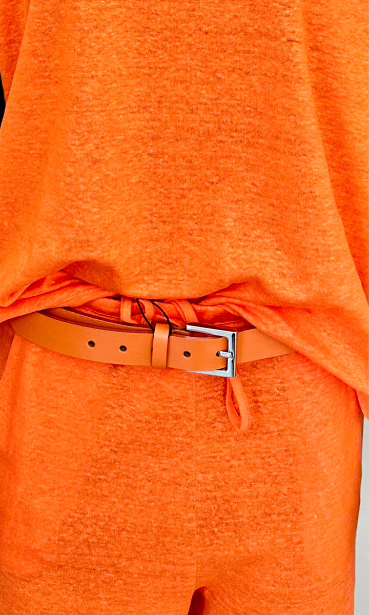 Skinnbelte i Oransje